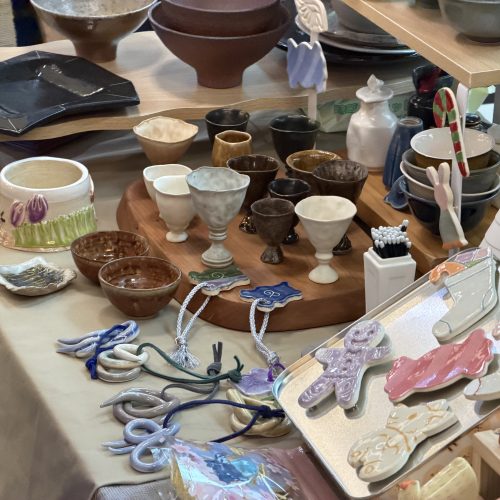 A close-up of small ceramic cups arranged on a booth at Central Market, Hong Kong, on April 10, 2026. Photo by Chen Meiyi.